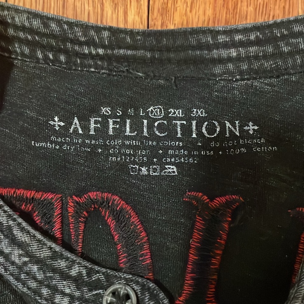Affliction - Picture 3 of 4